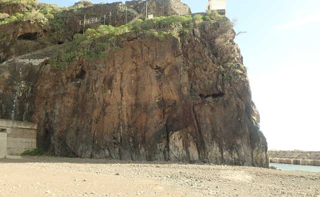 Climbing rock on the beach, Ribeira Brava